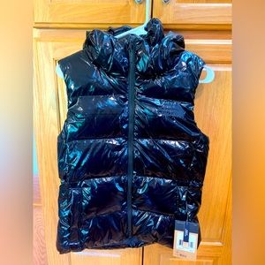The North Face Haxton Vest. Women’s size Small. Brand new with tags!